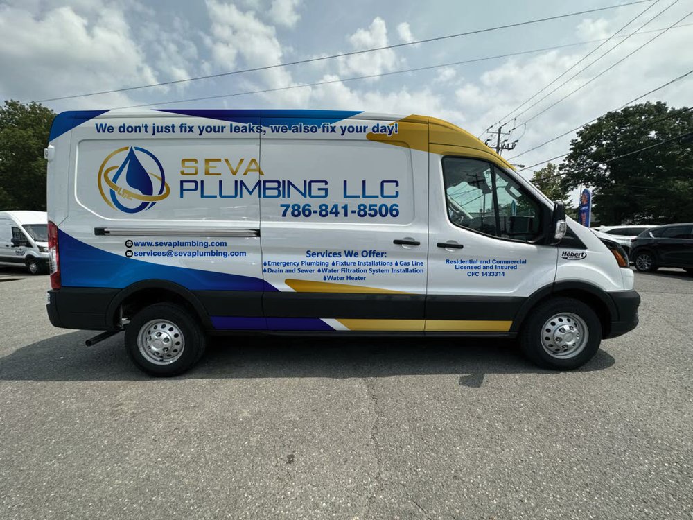 plumbing van with blue and yellow branding.
