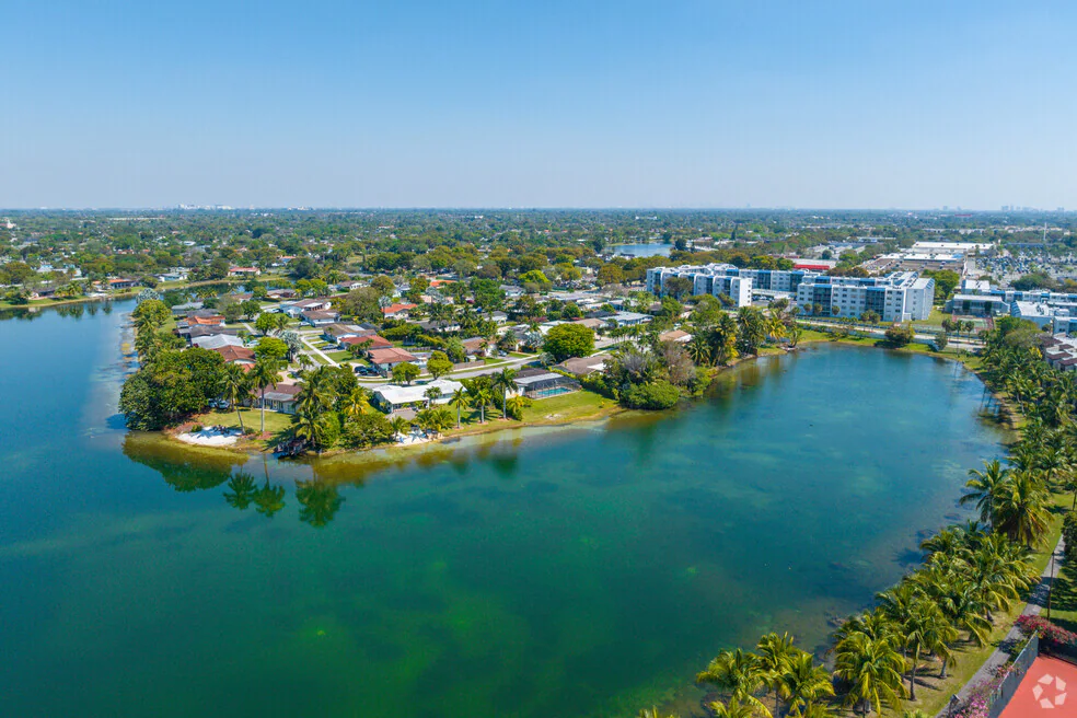 Aerial view of a residential area with a lake